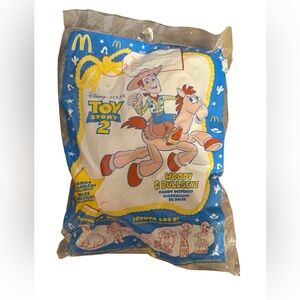 Toy Story 1999 vintage collectible McDonald’s toy Woody Bullseye candy dispenser